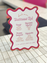 Load image into Gallery viewer, Custom Bottoms Up drinks menu sign with pink and orange wavy border