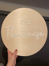 Load image into Gallery viewer, Round custom layered sign with raised white lettering